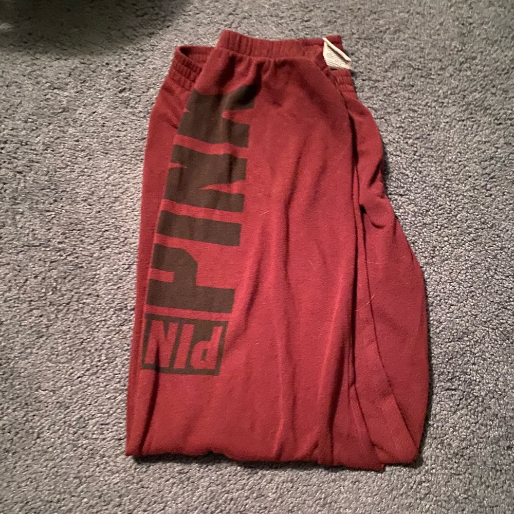 maroon (pink) sweatpants.